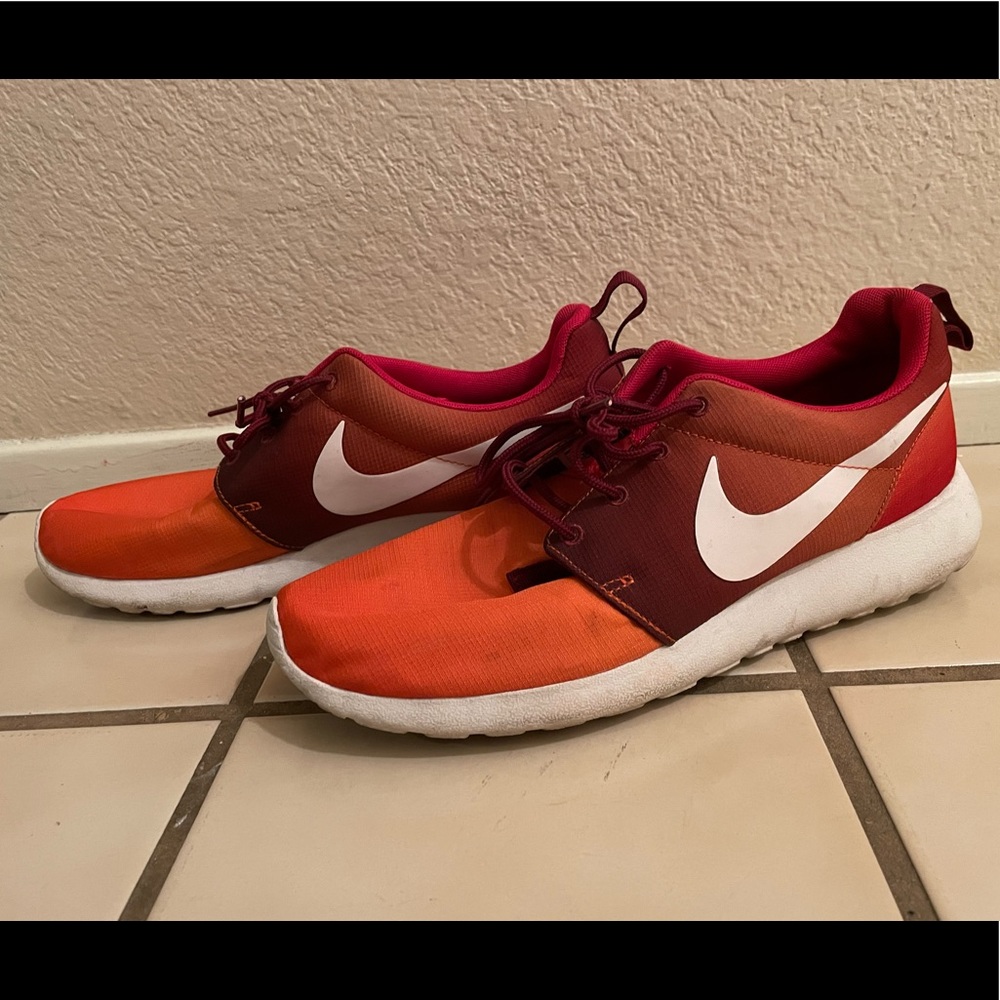 Nike Roshe Run. Men’s size 9. Red and orange gradient. Good condition.